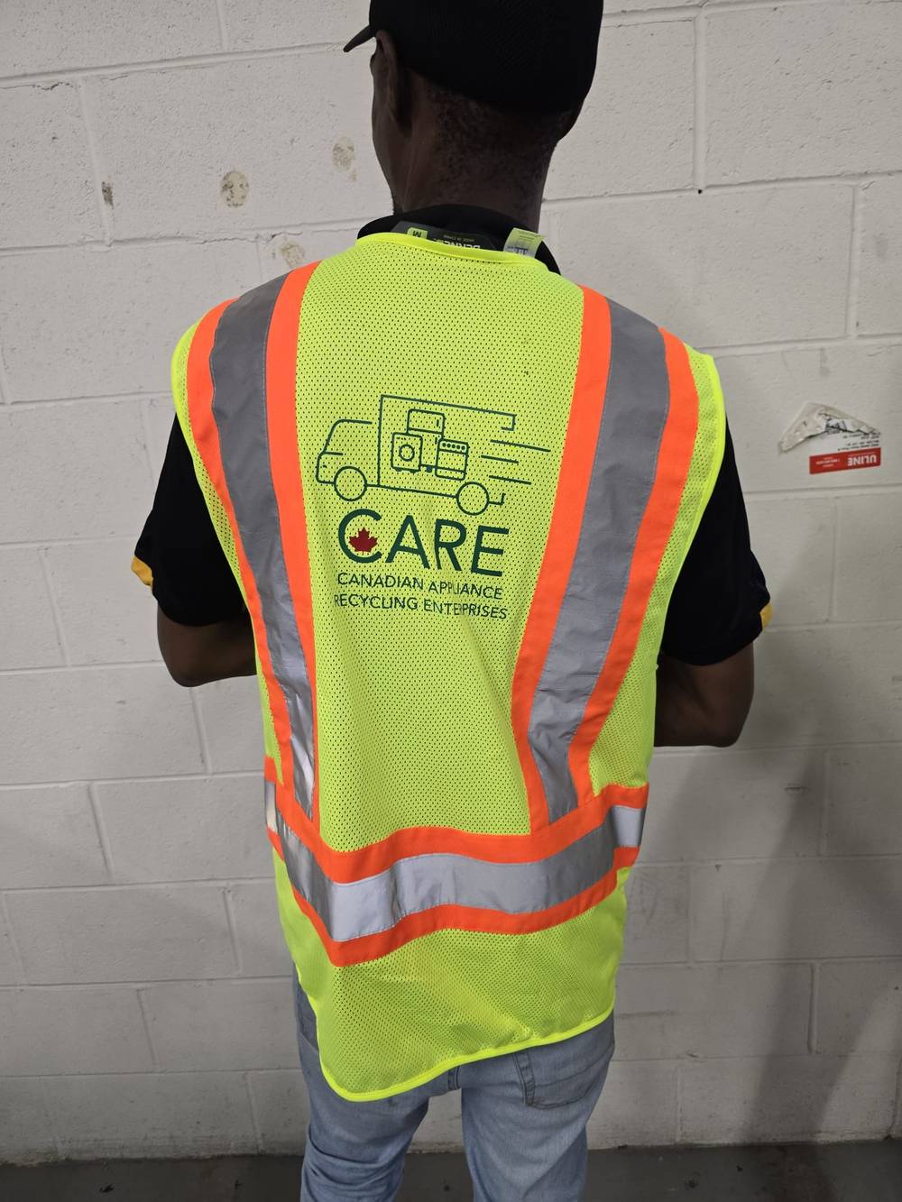 CARE technician in high-visibility safety vest
